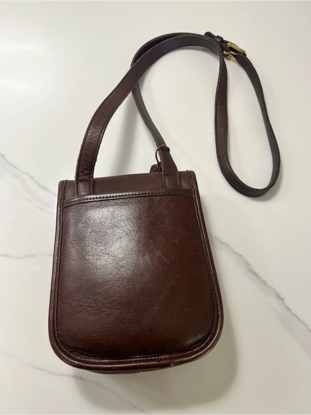 Vintage Coach Brown Leather Crossbody Bag with Gold Hardware.